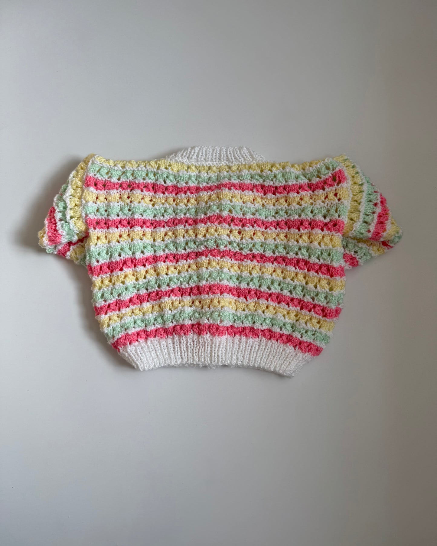 Hand-knitted pastel stripe cardigan bobble buttons 6–12m